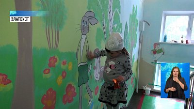 Жители разрисовали подъезд мультгероями