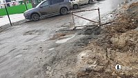 В Парковом рабочие повредили дорогу во время укладки тепловых сетей