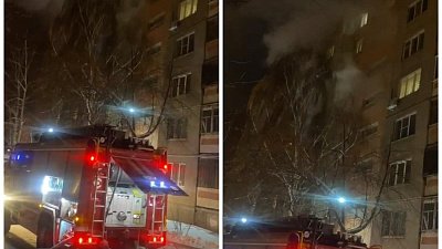 Пожарные сняли ребенка и женщину с горящего балкона в Магнитогорске