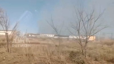 Дымящая свалка в Локомотивном попала на видео