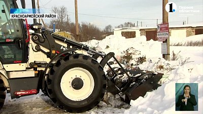 В селе Миасское очищают мусорные баки