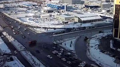 В Челябинске трактор перевозил людей через огромную лужу